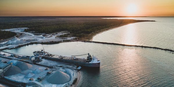 A Great Lakes Freighter loading stone in the early morning dawn.